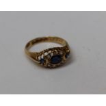 A yellow metal sapphire and diamond dress ring, stamped 18ct, size M, gross weight approx 2.8gm