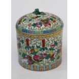 An early 20th century Chinese famille rose cylindrical covered jar, with squirrel finial,