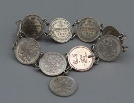 Silver bracelet with Kopeks, quantity nine, dates 1911-1916