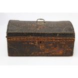 A small Victorian brass studded hide covered trunk with brass carry handle, 50cm wide