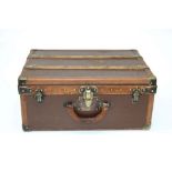 An early 20th century Louis Vuitton steamer case. Wood strapped, brass mounted and leather bound