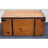 An Edwardian pine cabin trunk with twin side carry handles, metal strapping and tin lining, 101cm