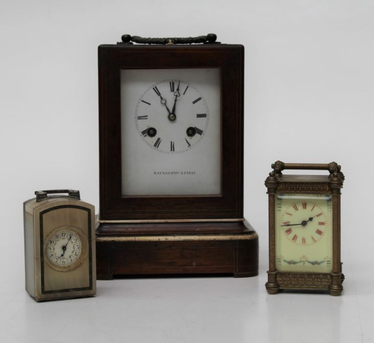 Raingo Freres, Paris, a 19th century rosewood case mantle clock with eight day bell striking