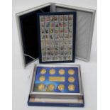 Various Olympic memorabilia comprising a framed set of twenty eight enamel badges relating to the