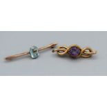 A pair of attractive bar brooches, one an amethyst set knot brooch in yellow metal, stamped 9ct,