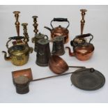 A box of metalwares, including brass ejector and other candlesticks, brass spirit kettle, lidded