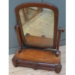 A mid-Victorian mahogany tilting dressing table mirror with drawers, c. 1870-80. Some damage