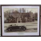 A large black and white photograph of Barry Fergusson-Wood of Jack Barclay Ltd at the wheel of