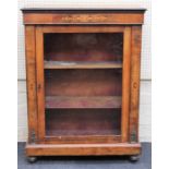 A 19th century walnut, boxwood inlaid and strung pier cabinet, the glazed door enclosing three