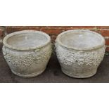 A pair of reconstituted stone garden planters, each decorated with leafy swags, 31 x 42cm