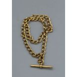 18ct gold watch albert chain, with T bar and fob clip. Gross weight approx. 57.8gm