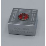 A Rolls Royce Enthusiastic Club Isle of Man chrome and enamel cube shaped paperweight, width 4cm