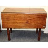 An early 19th century mahogany Pembroke table, the rectangular top and drop leaves with single