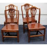 A matched set of nine early 19th century and later mahogany/elm shield back dining chairs, each