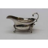 A silver footed cream jug, London 1931 by Goldsmiths and Silver company, weight approx 150gm/ 4.82