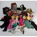 A collection of approximately one dozen mid 20th century home made papier-mâché glove and other