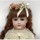 German  very good Antique Bisque head doll 390 A8M beautiful 25” Large doll in good clothing In