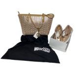 An unused  Moschino handbag in fawn leather and a woven rose gold design, still tagged and