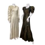 2 1930s gowns to include a couture Revillon fishtail gown with quilted desingd in a black rayon with