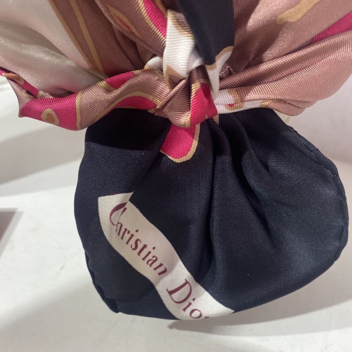 A 1960s turban made from a Christian Dior scarf, a 50s/60s bucket hat, a Schiaparelli stocking box - Image 2 of 3