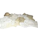 A box of early to mid 20th century children's wear to include a 20s/30s pongee silk coat, a white