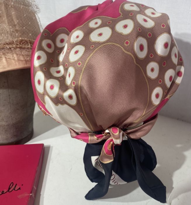 A 1960s turban made from a Christian Dior scarf, a 50s/60s bucket hat, a Schiaparelli stocking box - Image 3 of 3