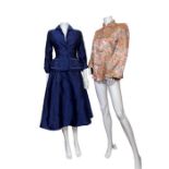 A 1950s Hattie Carnegie suit in midnight blue silk and a pink Chinese silk brocade jacket with