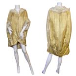 A 3/4 length 1920s cocoon coat with blouson back in yellow silk damask with white marabou trim and a