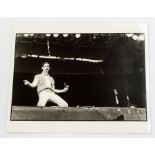 FRANK ZAPPA - Superb original 10 x 8  inch black and white photograph of Frank Zappa on stage. Not a