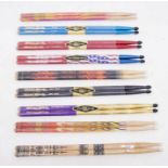 A collection of 9 pairs of Hard Rock Cafe Drums sticks - unused. From various Hard Rock Cafe