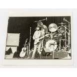 An original Black and White photograph of ERIC CLAPTON - live on stage. Original from Simon Fowler /