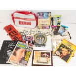 A Collection of Elvis Presley Memorabilia - Including a Bag, Stamps, Magazines and Books, Monthly