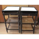 A pair of bedside tables in the Anglo Indian style with marble tops and wicker under tiers, wicker