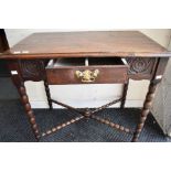 A late 17th century oak lowboy hall table with bobbin-turned legs and x-stretcher, peg joints and