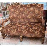 An early 20th century reproduction upholstered two-seater sofa chair, in the 18th century style,