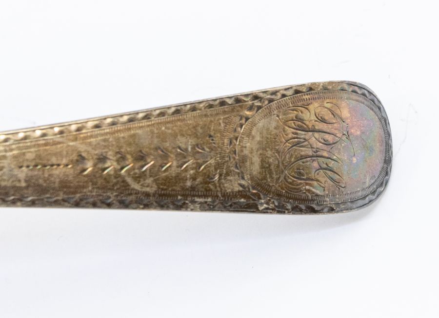 A George III bright-cut engraved serving spoon, hallmarked by Hester Bateman, London, 1785, approx - Image 4 of 4