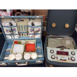 1960s' picnic set in a carrycase, along with a reel-to-reel tape recorder in a carrycase