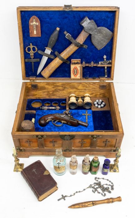 A composed Victorian style vampire hunter's killing kit, comprising mallet, hatchet, early 20th