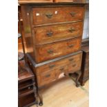 Queen Ann style three drawer chest on stand, with four base drawers, swing handles on padded feet