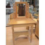 A collection of antique pine furniture comprising bedside cabinet, toilet mirror, washstand, wall