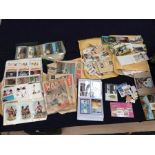 Collection of postcards, cigarette cards and a few 20th century stamps
