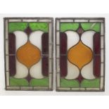 Two early 20th century stained glass panels, , 55 x 36cm, a f condition