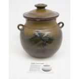 Studio pottery: A large lidded storage jar with stylised landscape decoration to the outside. Height