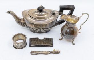 A group of early 20th Century silver to include: batchelor's teapot (ebonised handle and finial);