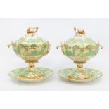 Pair of 19th century sauce pots with lids and stands, green and gilt detail with flower and