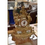 Early 20th century gilt spelter mantel clock with ceramic tile detail and face