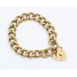 A 9ct gold curb link chain bracelet, link width approx 10mm, with padlock clasp, length approx 18cm,