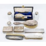 A set of six Victorian silver mounted travelling / dressing table glass boxes and silver cover,