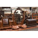 Two early 20th century wooden swing/toilet mirrors and a Jones cased table top sewing machine