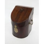 A George II mahogany slope front knife box with brass carrying handles, plain oval escutcheon and